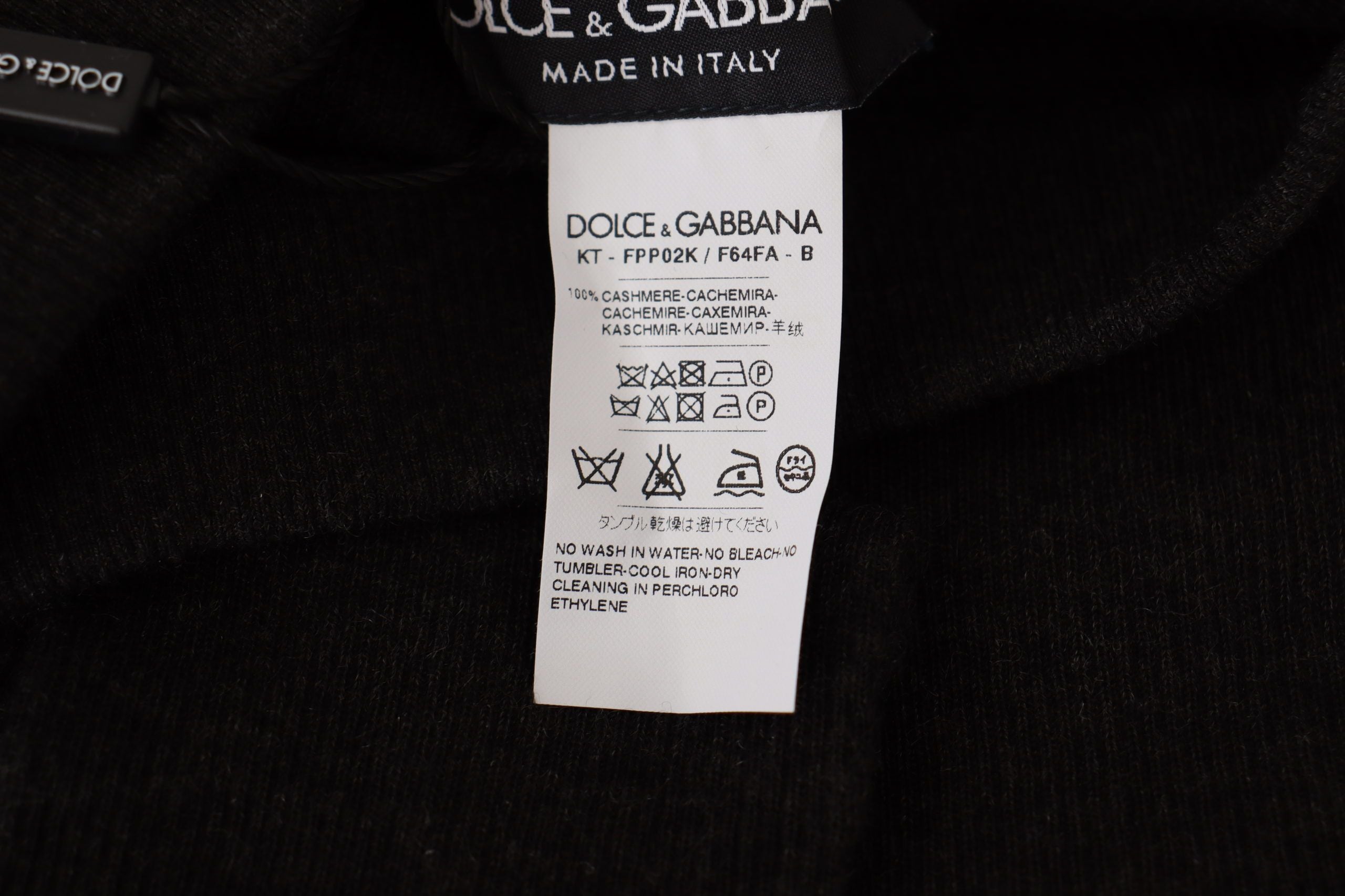 Gray cashmere tights from Dolce & Gabbana, showing close-up of soft, fitted pantyhose fabric and waistband detail.