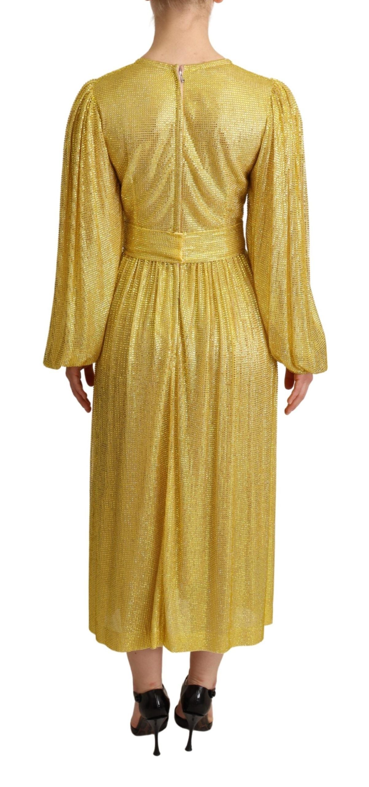 Yellow crystal mesh pleated maxi dress by Dolce & Gabbana, featuring shimmering crystals and flowing fabric.