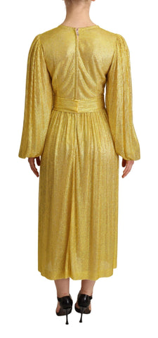 Yellow crystal mesh pleated maxi dress by Dolce & Gabbana, featuring shimmering crystals and flowing fabric.