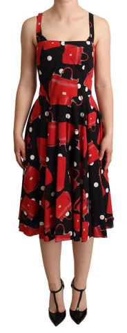 Black and red bag print A-line mid-length dress by Dolce & Gabbana featuring bold pattern and elegant silhouette.
