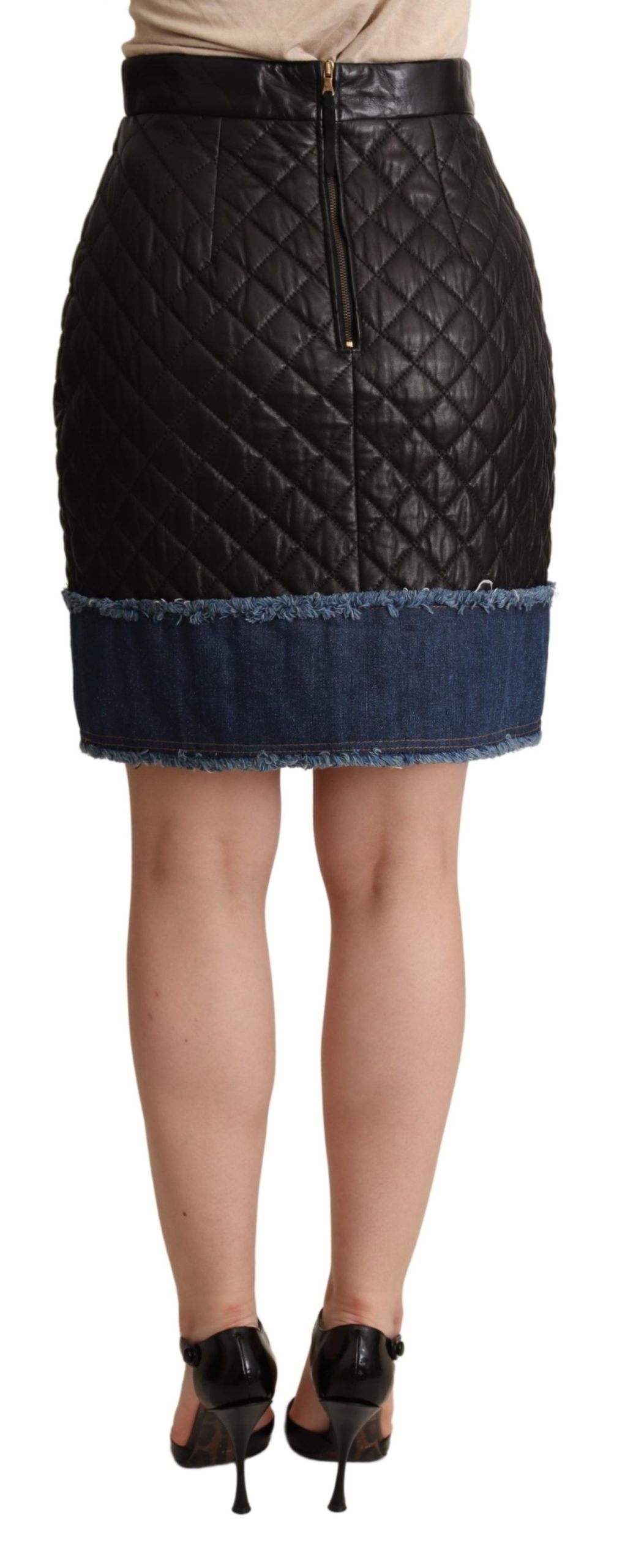 Black quilted leather mini skirt by Dolce & Gabbana, showcasing a stylish fitted design with quilted texture and silver button details.