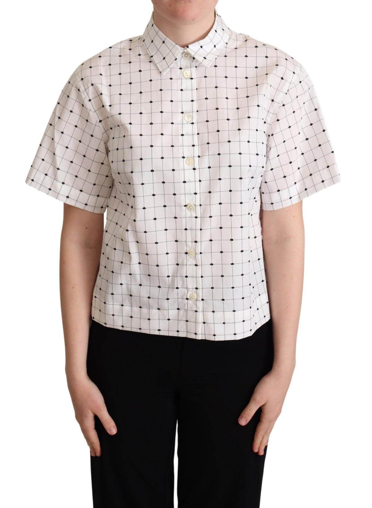 White cotton collared shirt top with black polka dots by Dolce & Gabbana, featuring a classic button-up design.