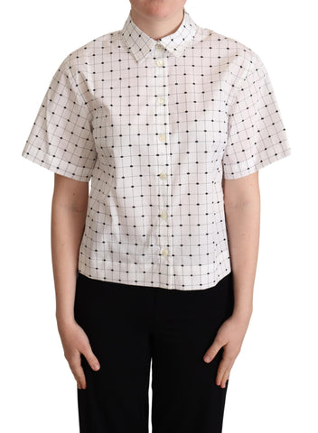 White cotton collared shirt top with black polka dots by Dolce & Gabbana, featuring a classic button-up design.