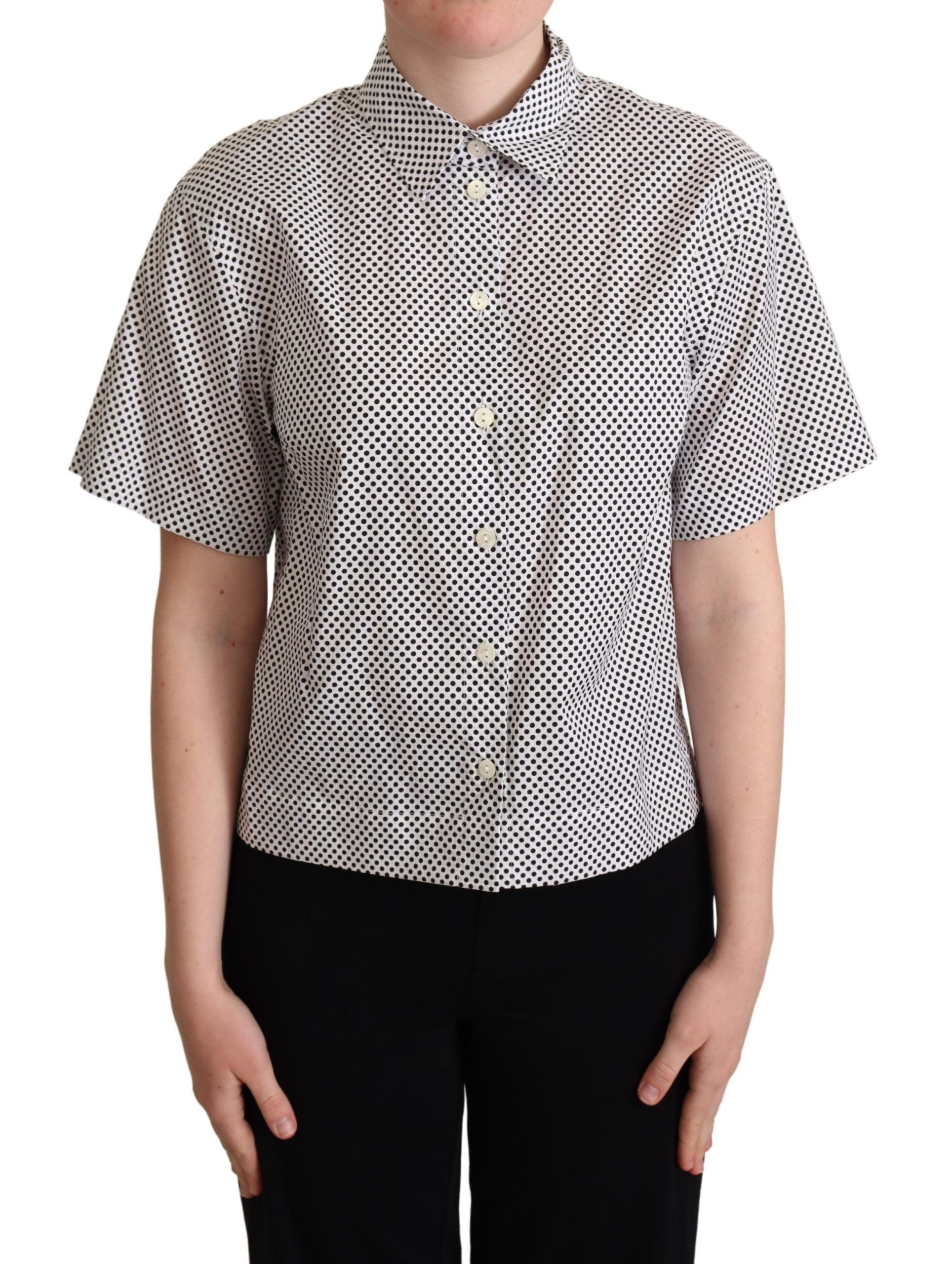 Black polka dot collared shirt by Dolce & Gabbana, featuring a white background and classic button-up design.