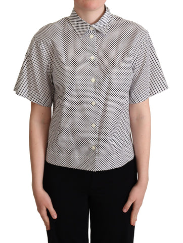 Black polka dot collared shirt by Dolce & Gabbana, featuring a white background and classic button-up design.