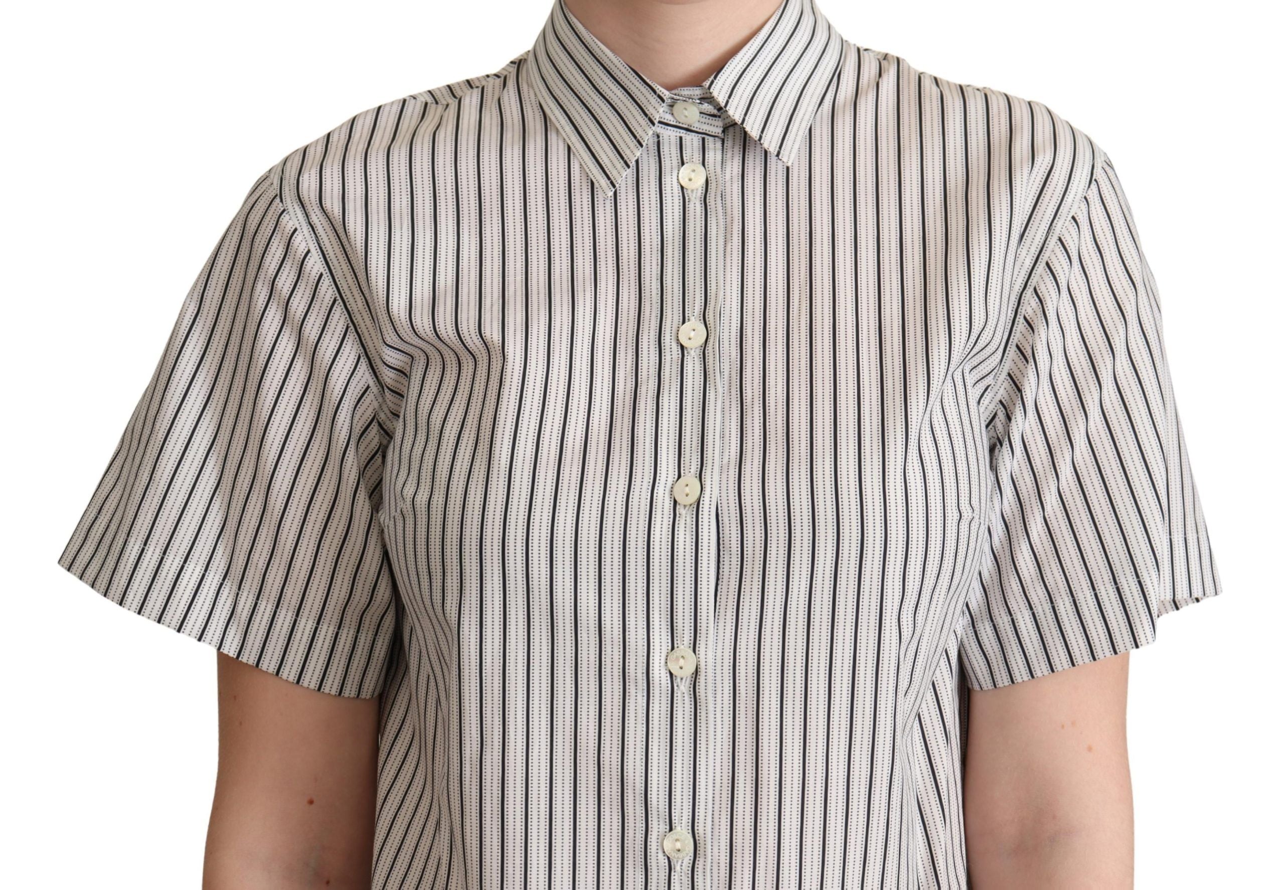 White and black striped collared shirt by Dolce & Gabbana, featuring a classic design and button-up front.