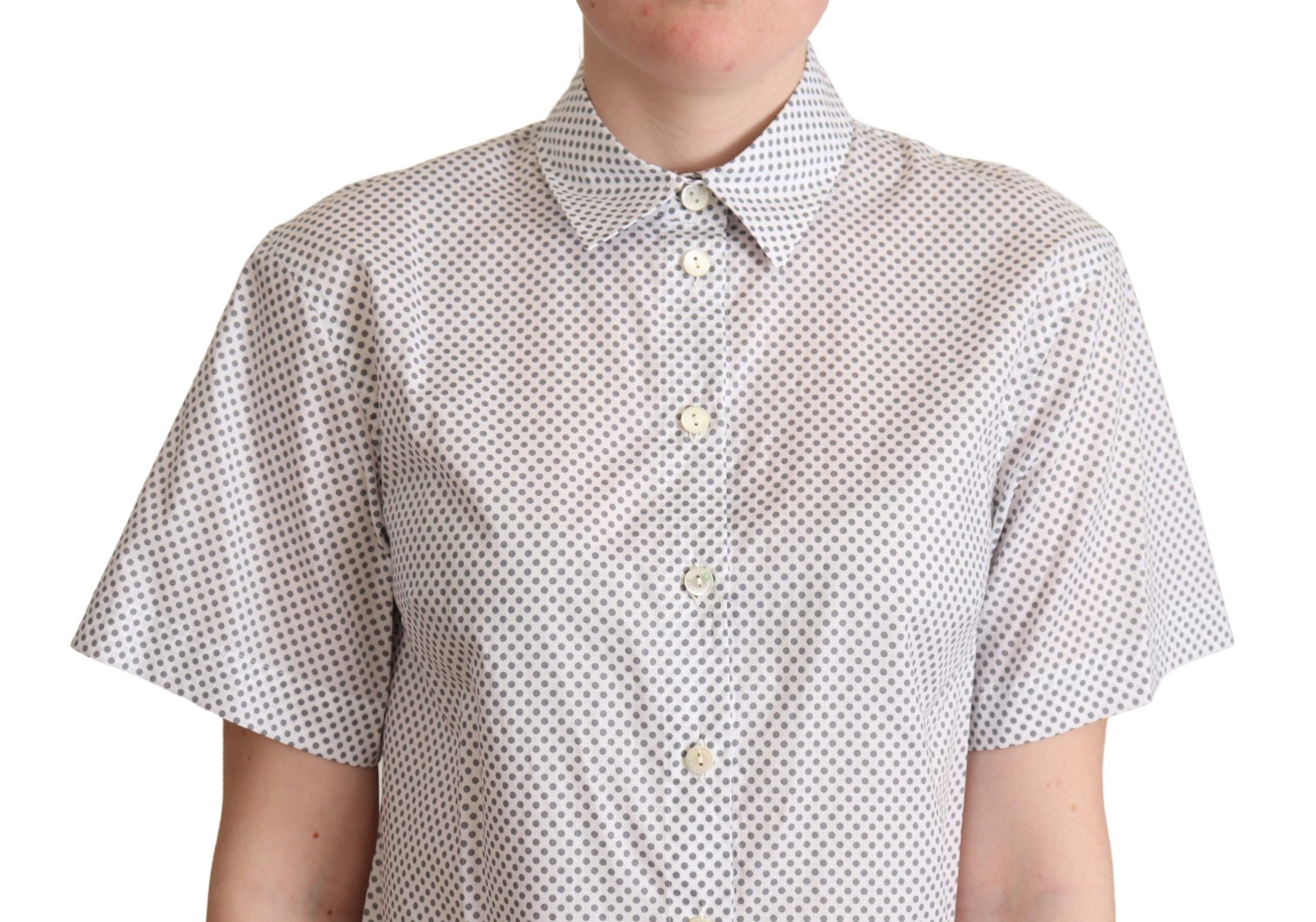 White and gray polka dot collared button shirt by Dolce & Gabbana, featuring a classic design with button closure and collar.