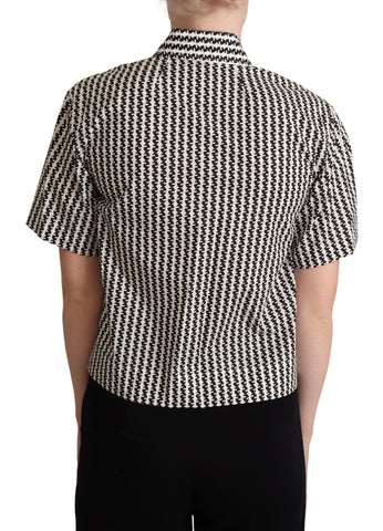 White and black fantasy pattern shirt by Dolce & Gabbana, featuring intricate design and stylish collar detail.