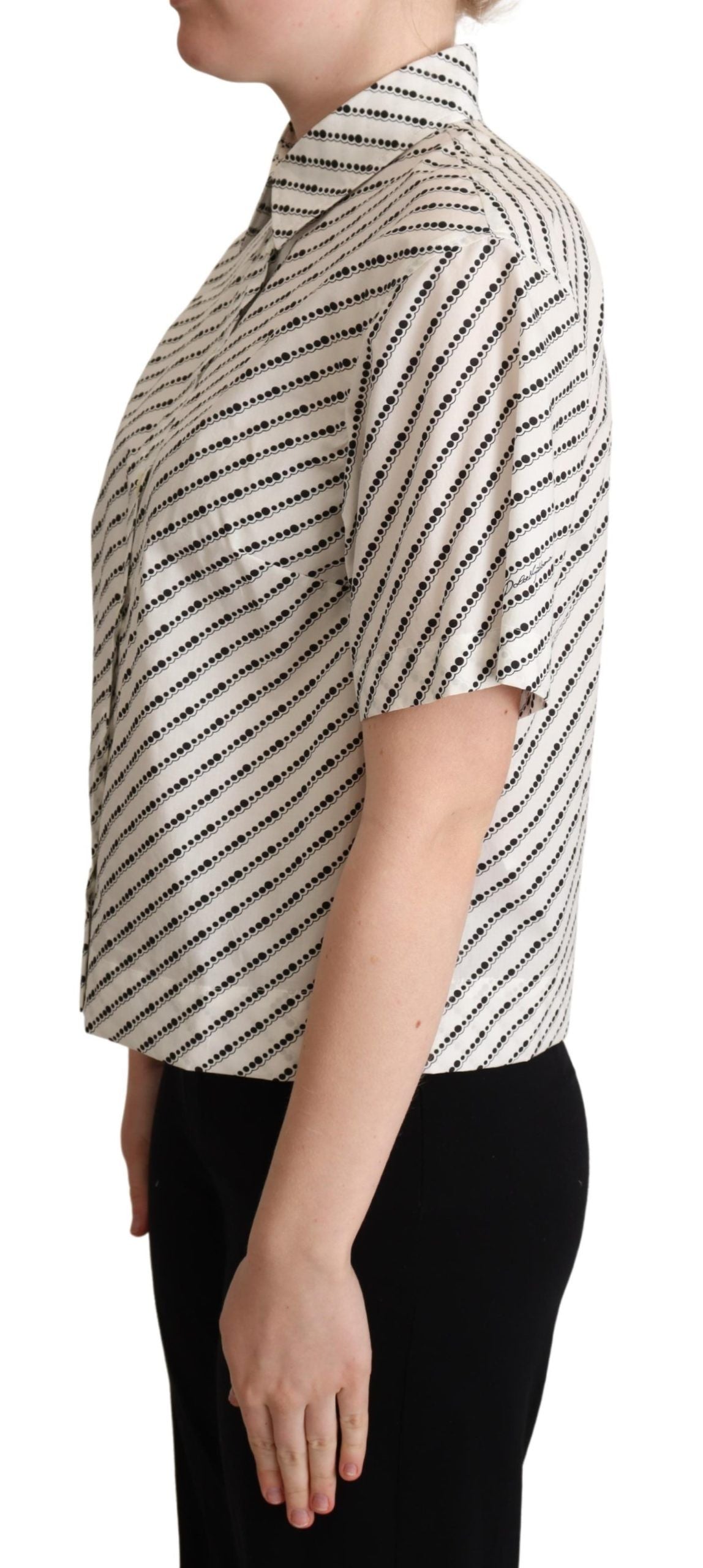 White dotted collared blouse shirt by Dolce & Gabbana, featuring a classic button-up design and elegant collar detail.