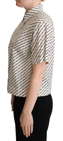 White dotted collared blouse shirt by Dolce & Gabbana, featuring a classic button-up design and elegant collar detail.