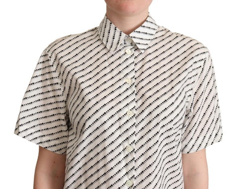 White dotted collared blouse shirt by Dolce & Gabbana, featuring a classic design with a button-up front and long sleeves.