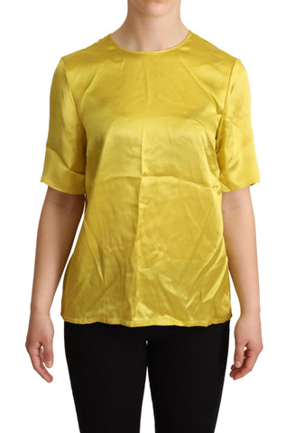 Yellow silk short sleeve blouse T-shirt by Dolce & Gabbana, featuring a smooth fabric and classic fit in the image.