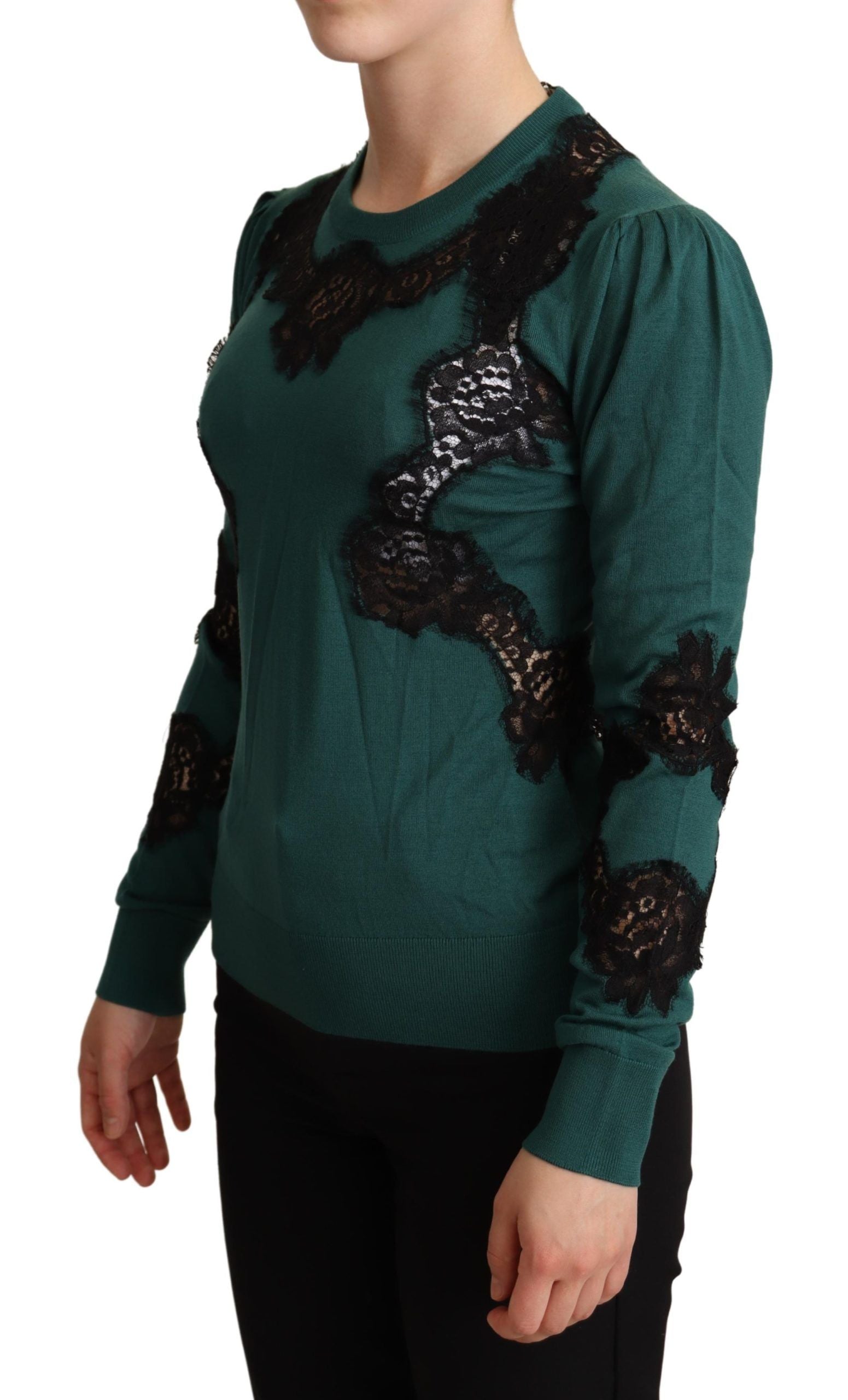 Green wool crewneck sweater by Dolce & Gabbana, close-up showing soft knit fabric and classic design.