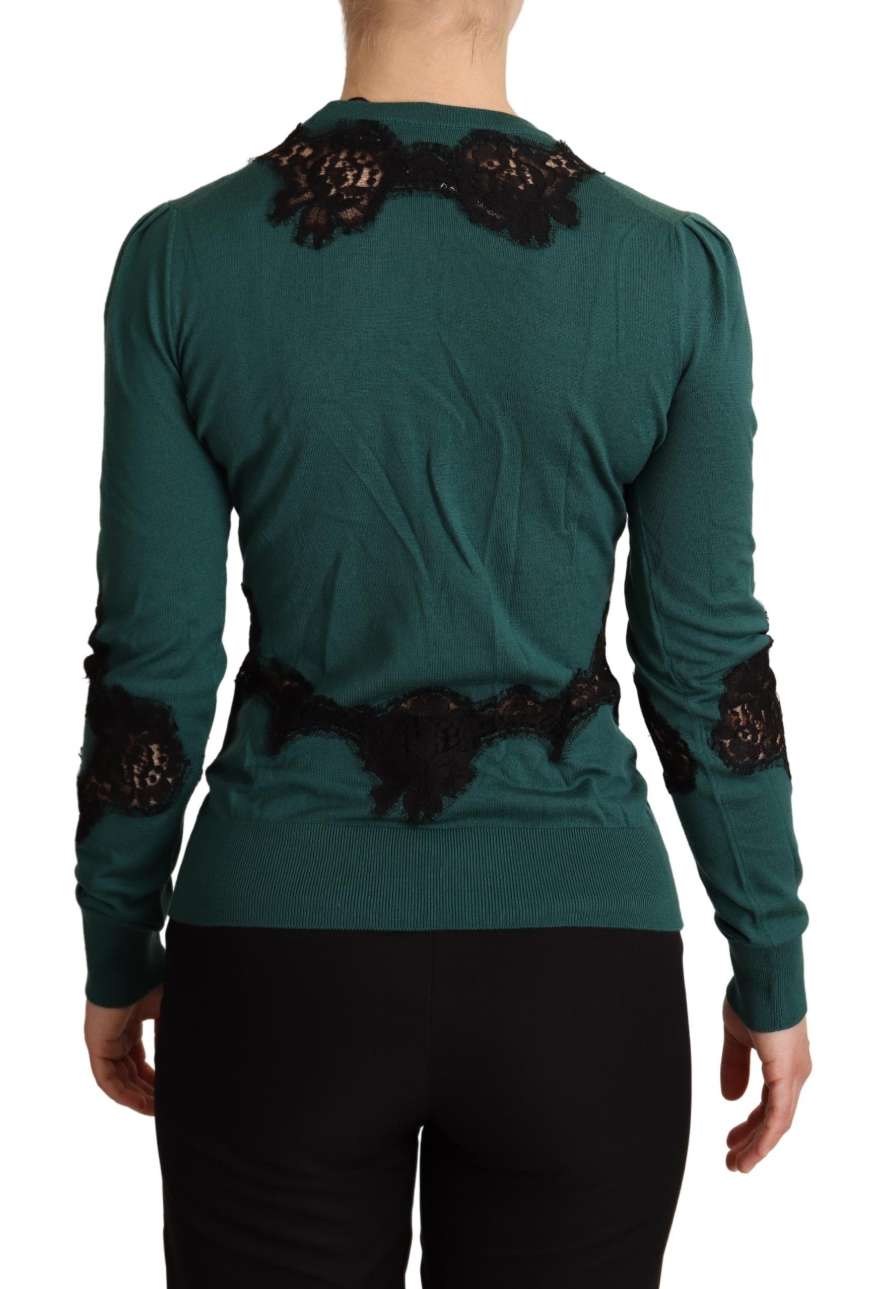 Green wool crewneck sweater by Dolce & Gabbana, close-up showing soft knit fabric and classic fit.