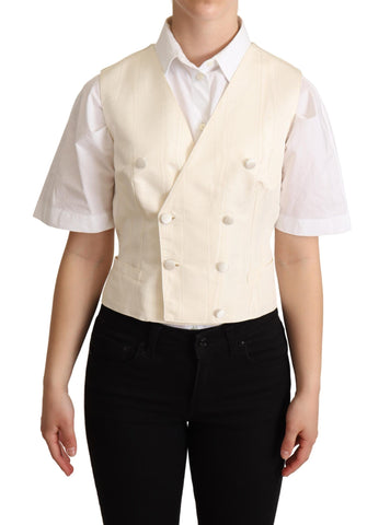 Beige silk sleeveless waistcoat vest by Dolce & Gabbana, tailored fit with smooth fabric and classic design.