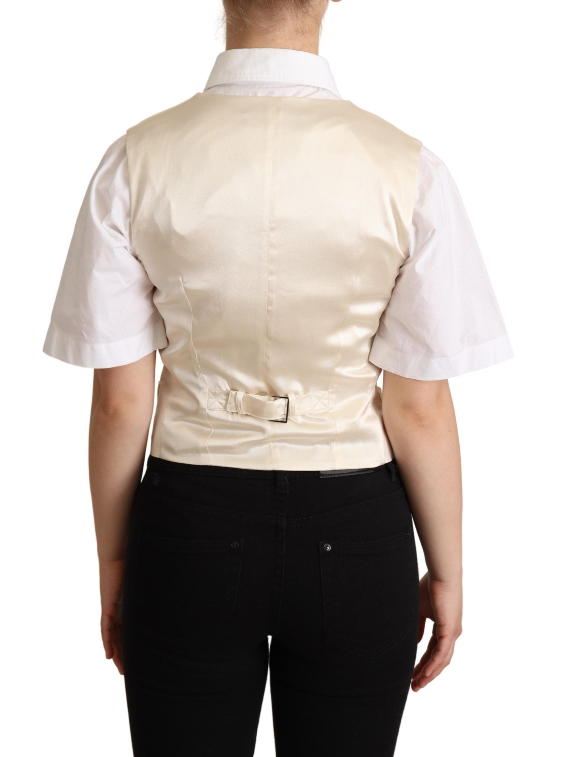Beige silk sleeveless waistcoat vest by Dolce & Gabbana, tailored fit with smooth fabric and classic style.