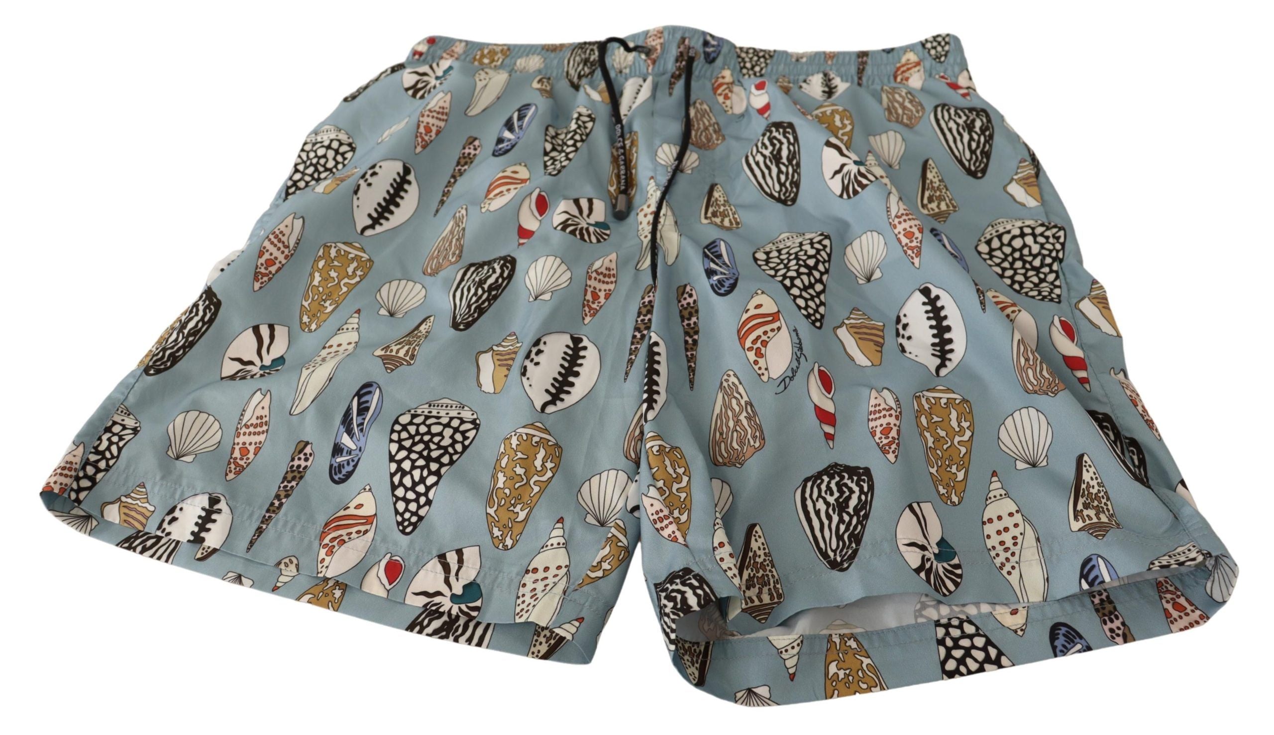 Blue seashell pattern Dolce & Gabbana swimwear shorts with a relaxed fit, featuring vibrant beach-inspired print and comfortable fabric.