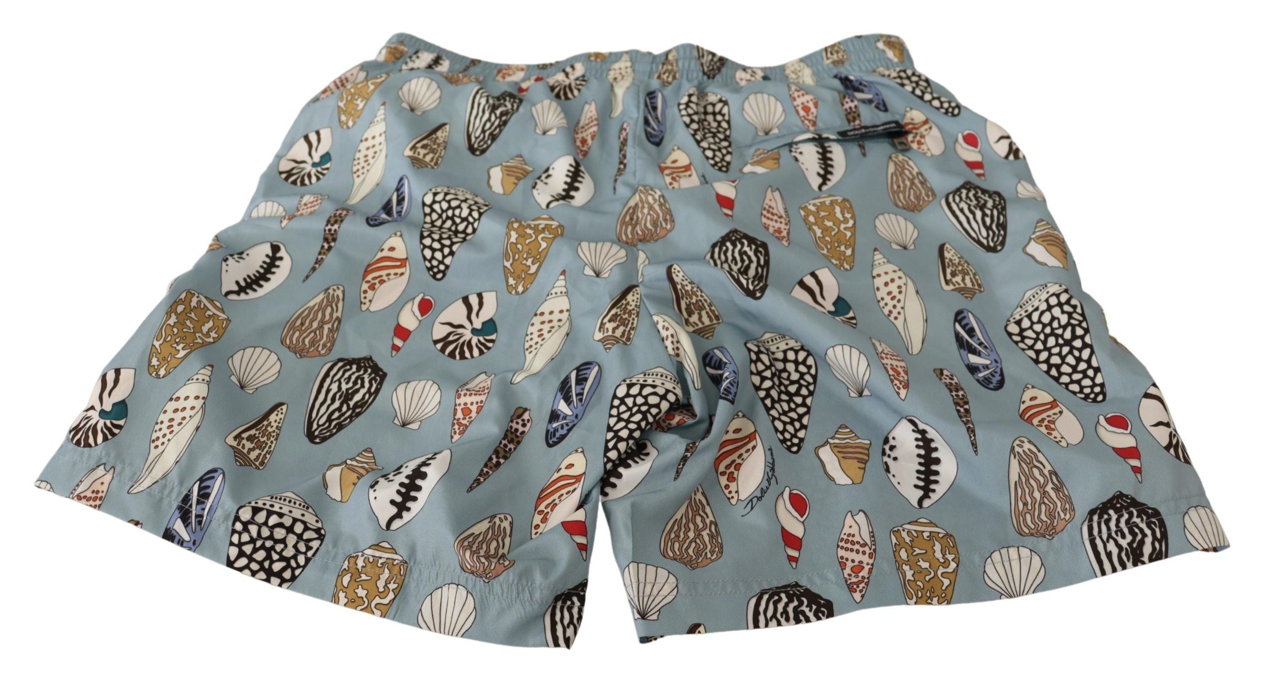 Blue seashell print Dolce & Gabbana beachwear swimwear shorts with elastic waistband and relaxed fit.