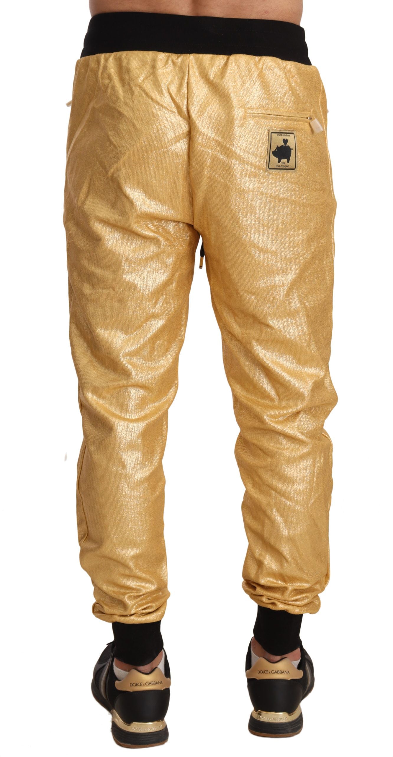 Gold Pig Of The Year cotton trousers by Dolce & Gabbana, featuring a relaxed fit and stylish design.