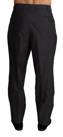 Gray wool blend formal trousers by Dolce & Gabbana, tailored fit with classic waistband and crease front, suitable for business or formal wear.