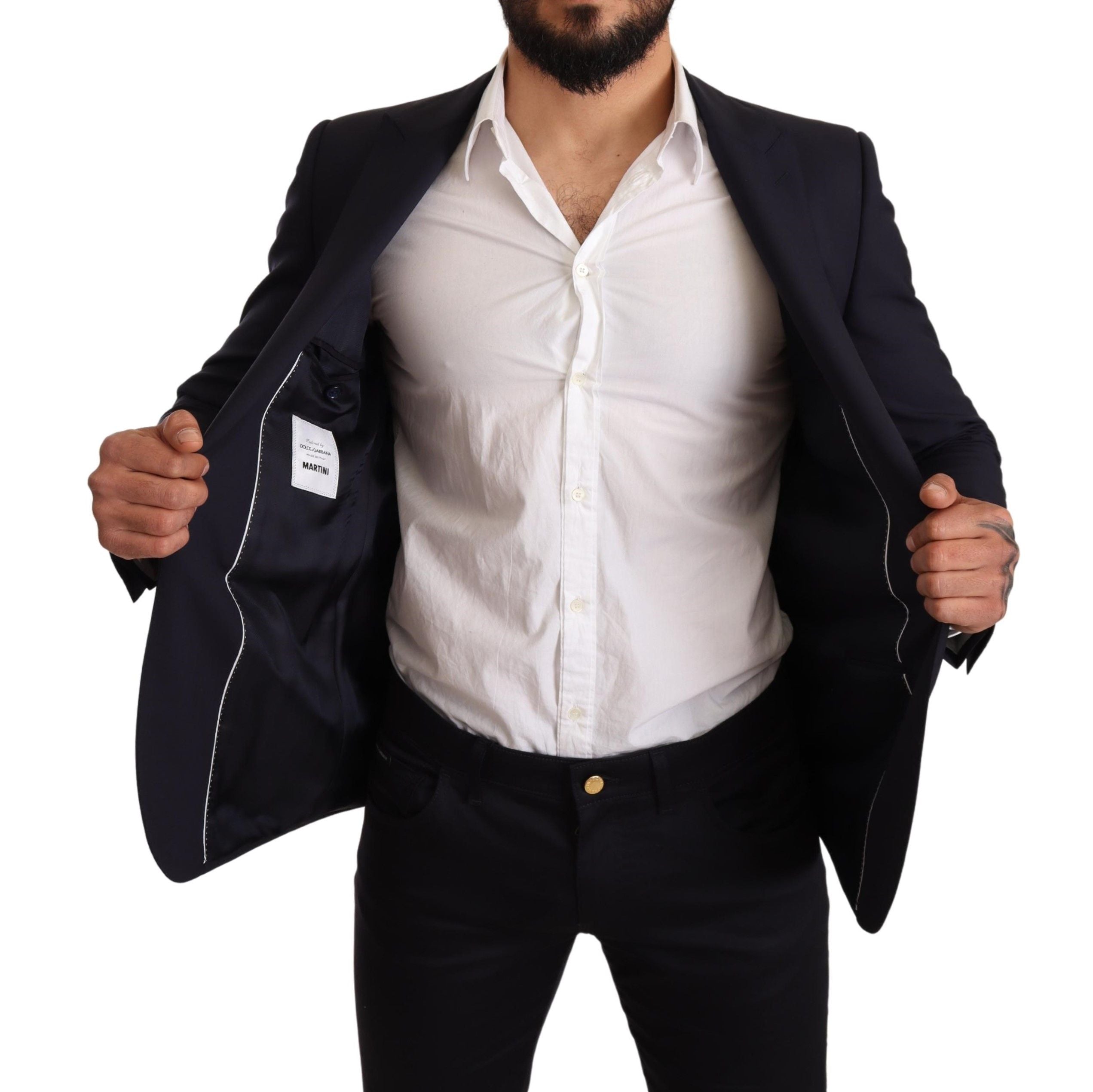 Navy blue wool slim fit Martini blazer by Dolce & Gabbana, tailored with a sharp lapel and structured fit.