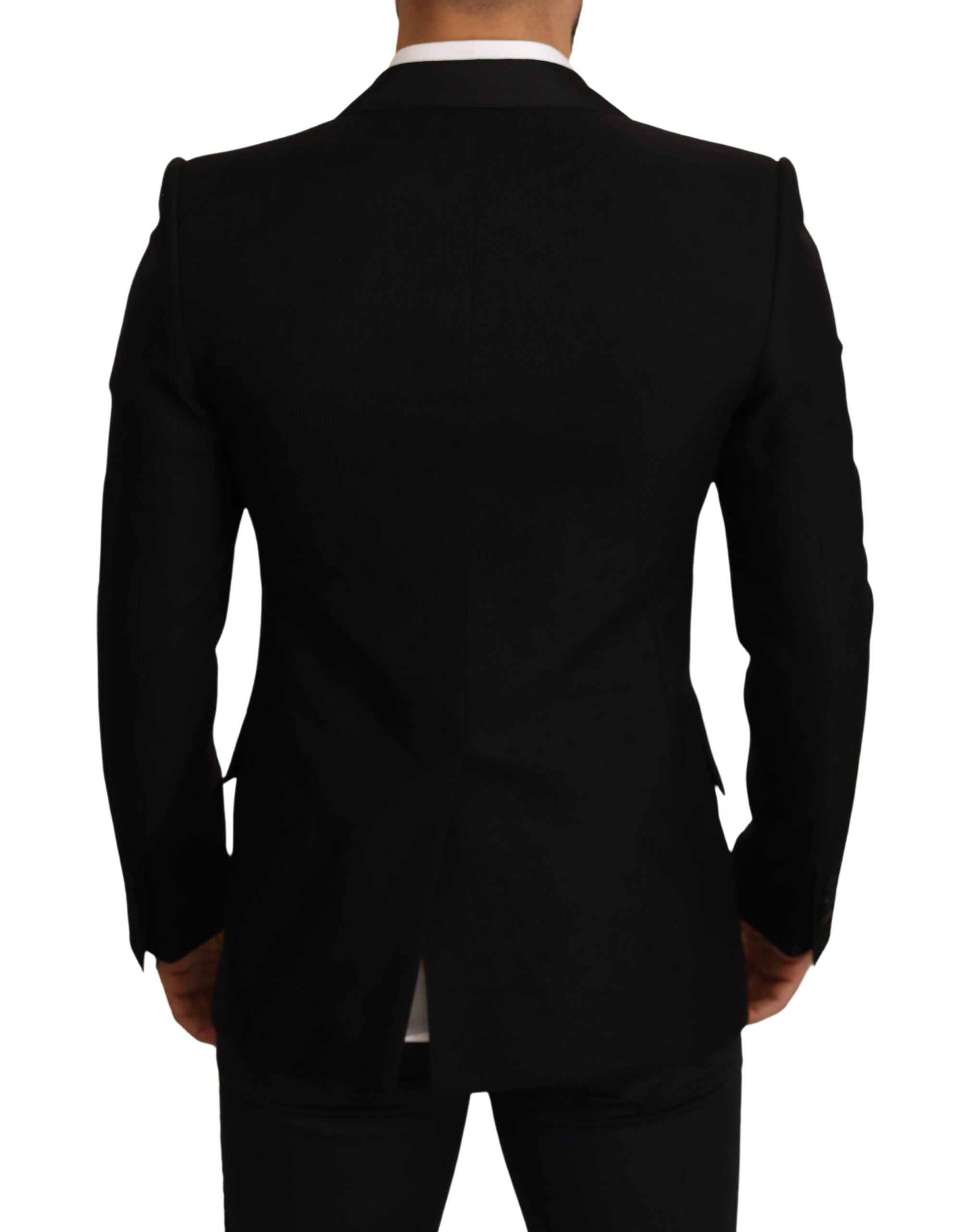 Black wool slim fit coat blazer jacket from Dolce & Gabbana with tailored design and classic lapel collar.