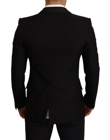 Black wool slim fit coat blazer jacket from Dolce & Gabbana with tailored design and classic lapel collar.