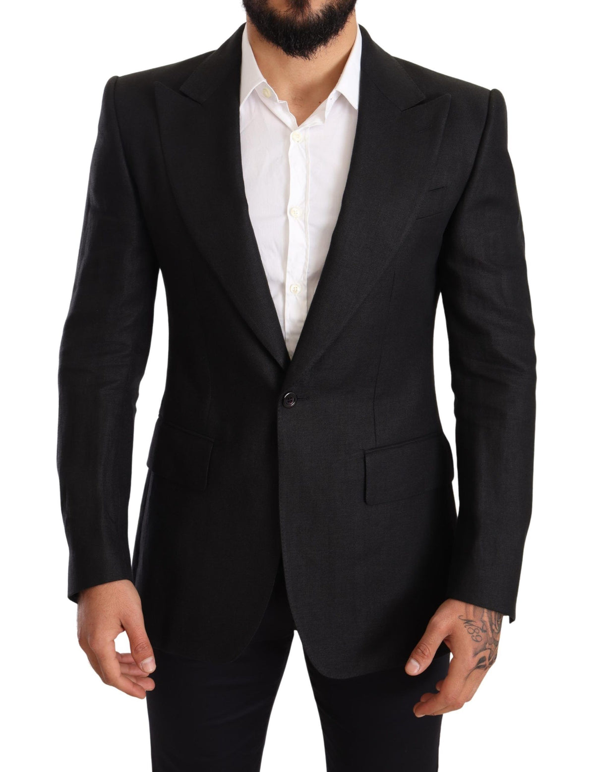 Black linen slim fit coat blazer by Dolce & Gabbana, tailored with a sleek design and classic lapel, shown on a hanger.