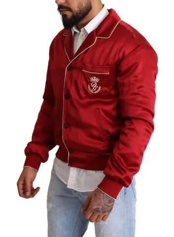 Red silk bomber jacket with DG logo buttons by Dolce & Gabbana, featuring a stylish fit and vibrant color.