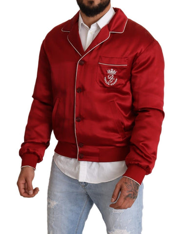 Red silk bomber jacket with Dolce & Gabbana DG logo buttons and front zipper, stylish and vibrant men's or women's outerwear.