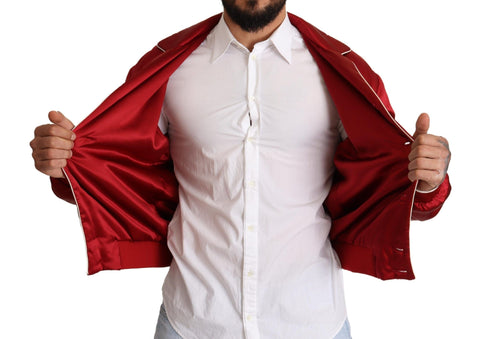 Red silk bomber jacket with DG logo buttons by Dolce & Gabbana, featuring a stylish fit and vibrant color.