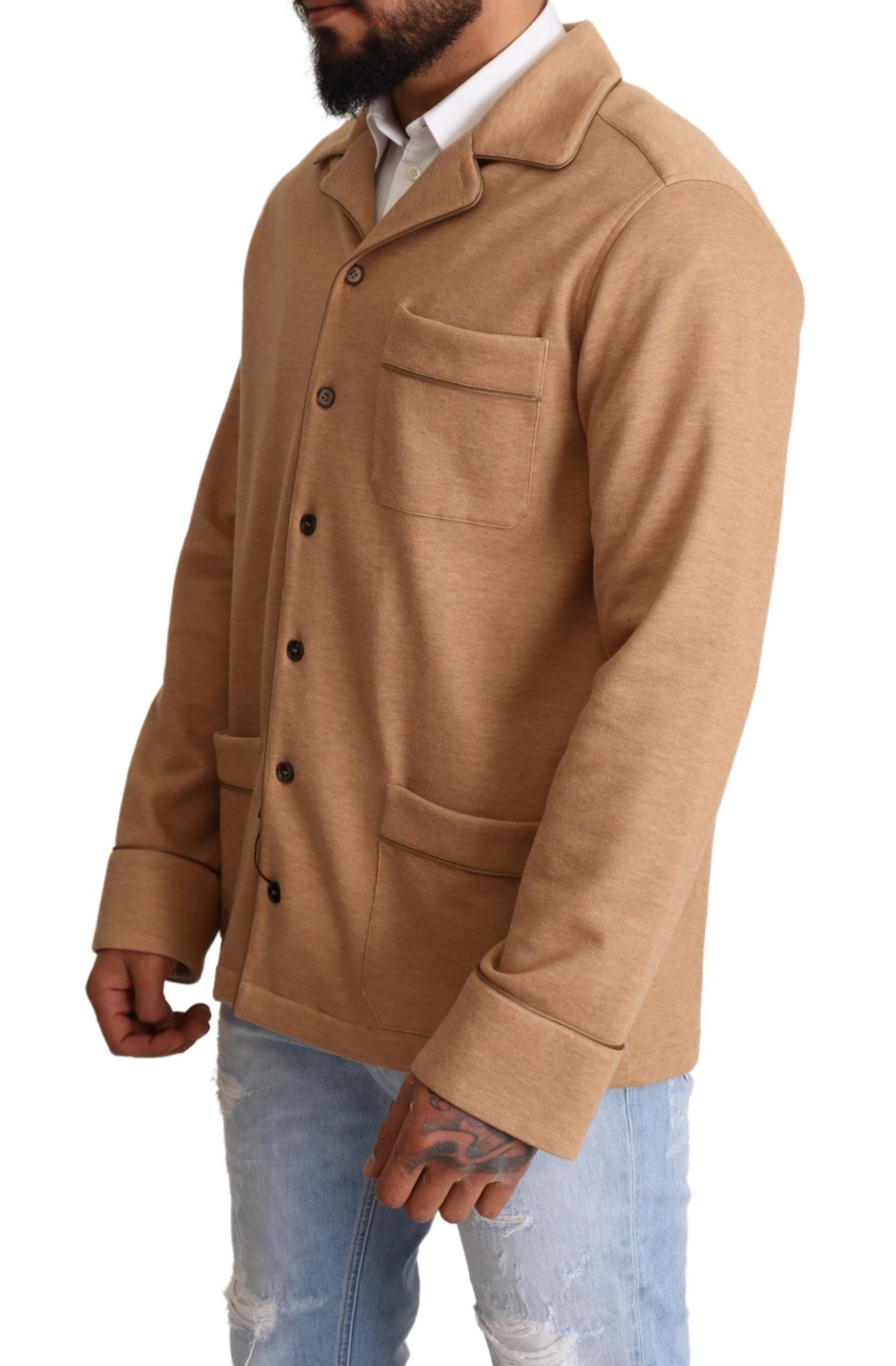 Brown cotton button-collared coat jacket by Dolce & Gabbana with classic tailored design and front button closure.