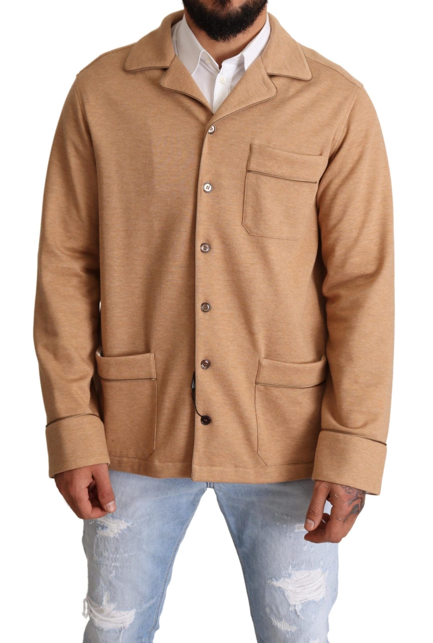 Brown cotton buttoned collar coat jacket by Dolce & Gabbana, displayed on a hanger with visible front details and classic design.