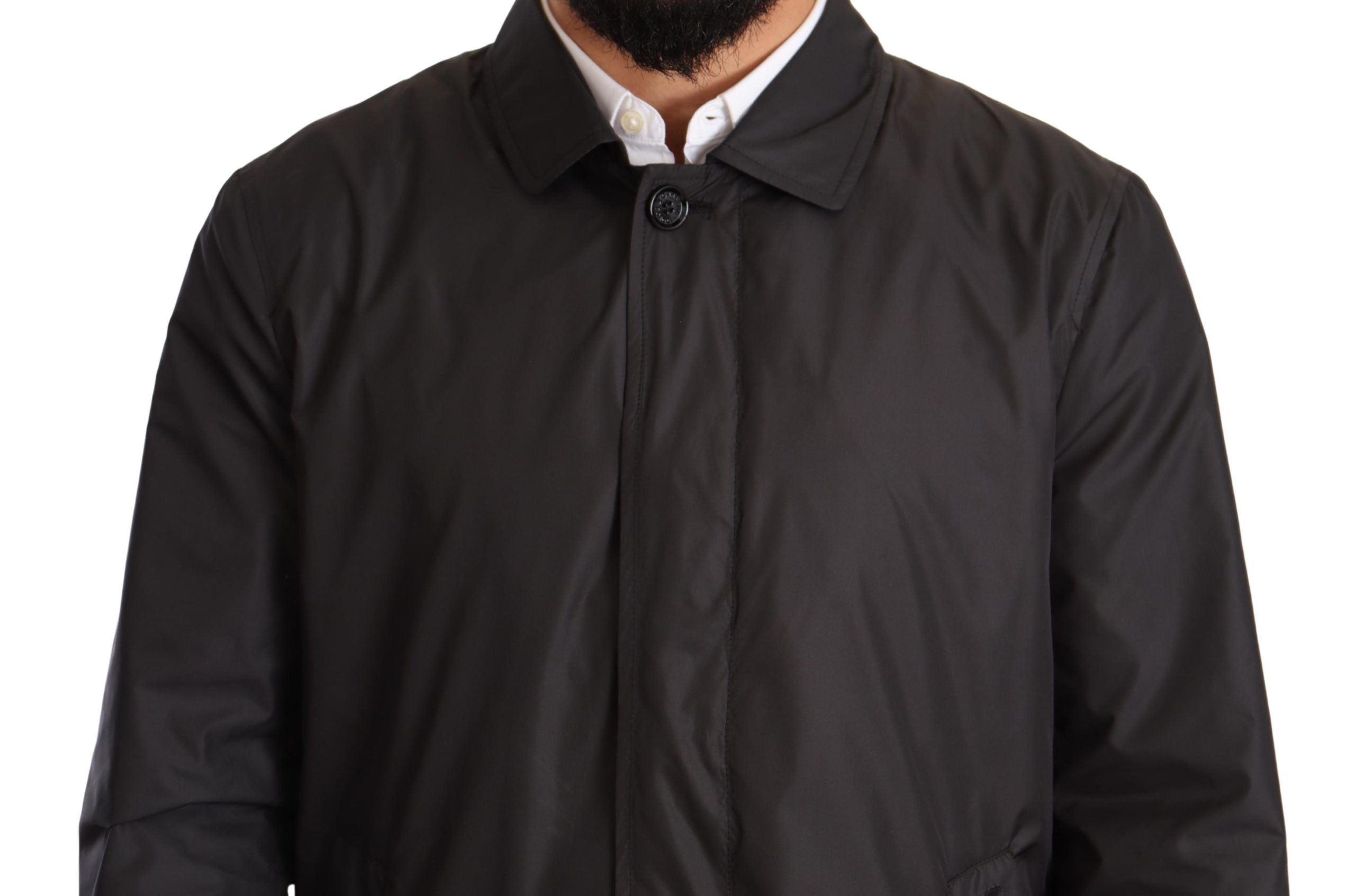 Black polyester men's trench coat jacket by Dolce & Gabbana, featuring classic design and tailored fit.