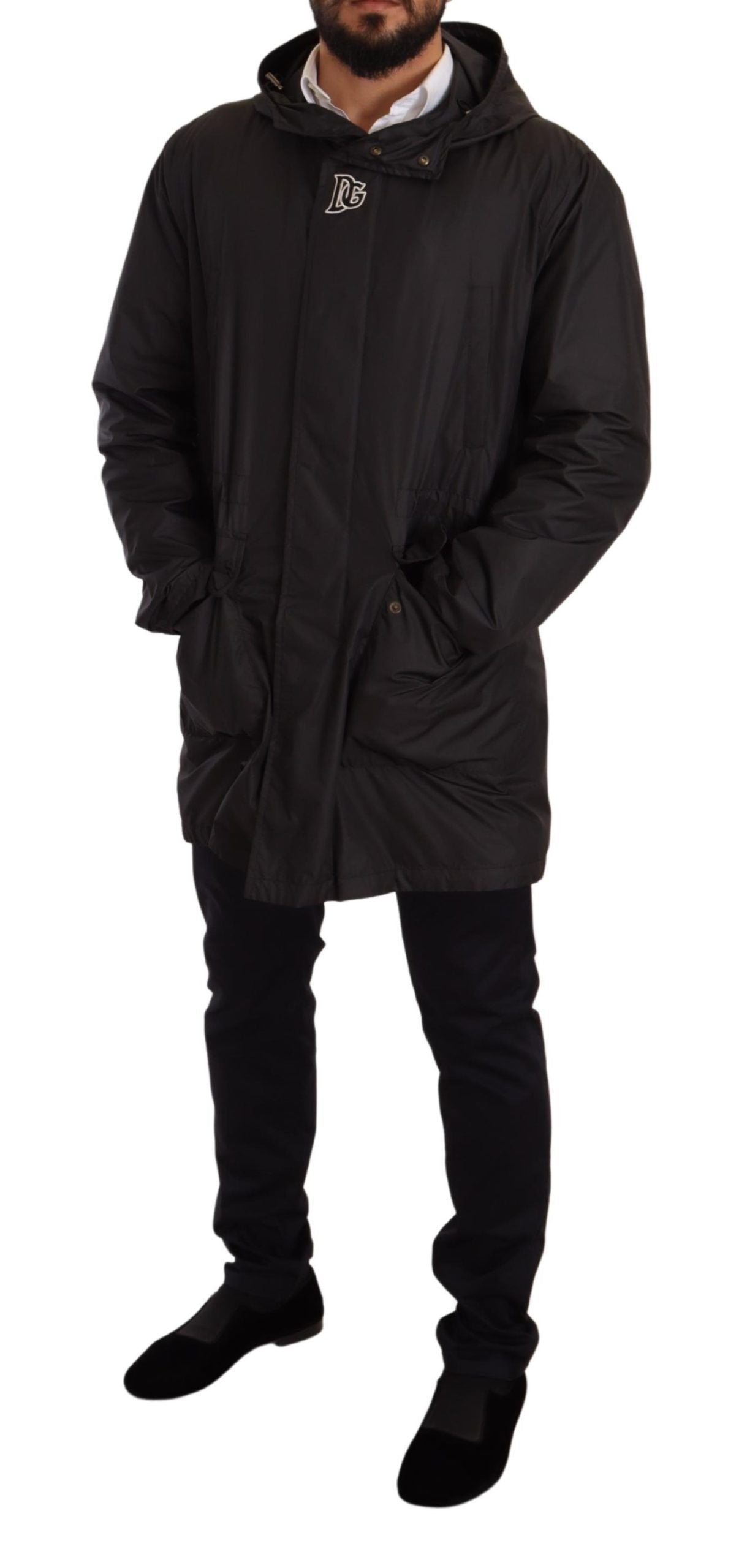 Black hooded men's trench coat jacket by Dolce & Gabbana, featuring a sleek design and classic silhouette.