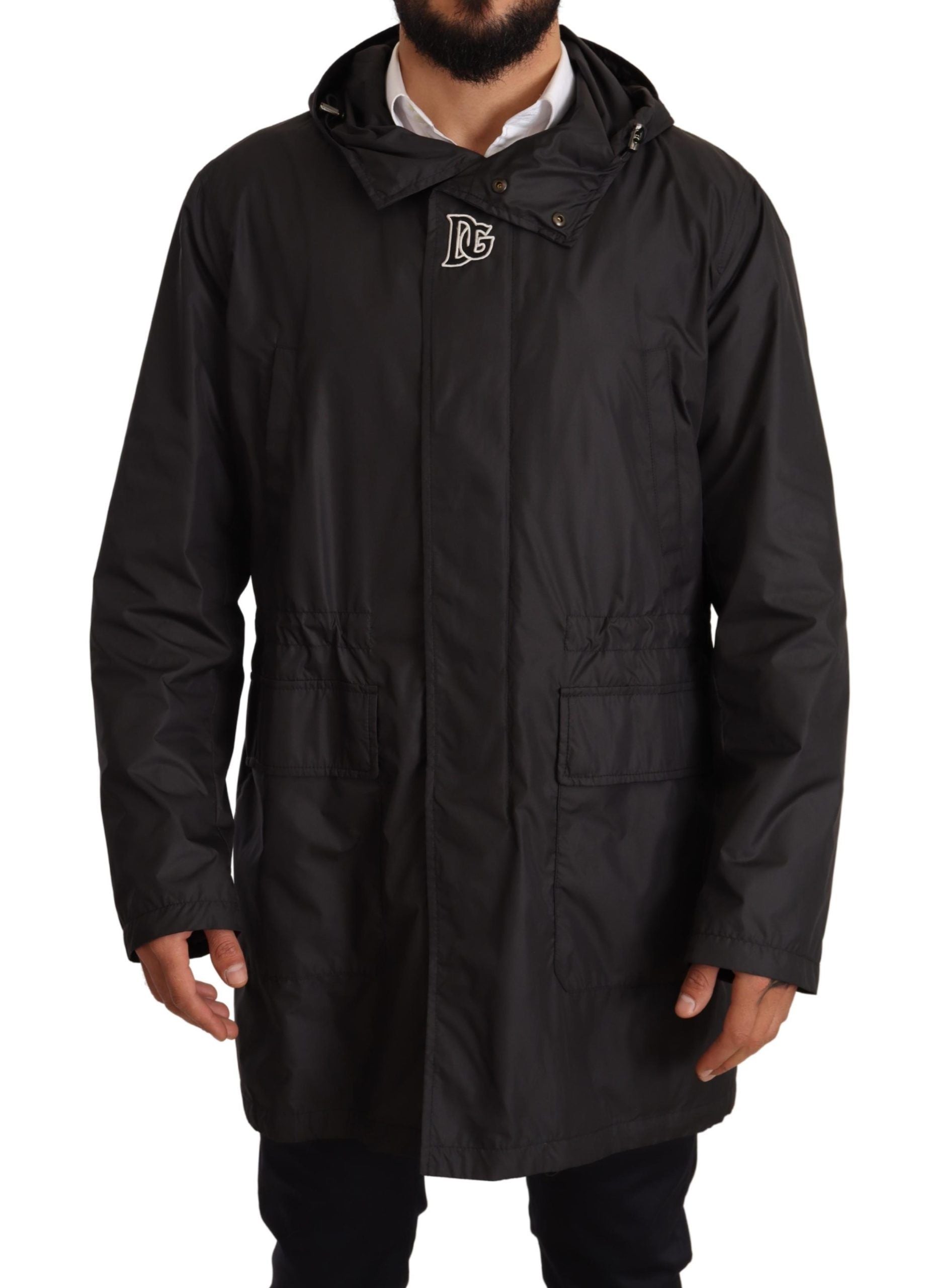 Black hooded men's trench coat jacket by Dolce & Gabbana, showing front view with hood and classic trench design.