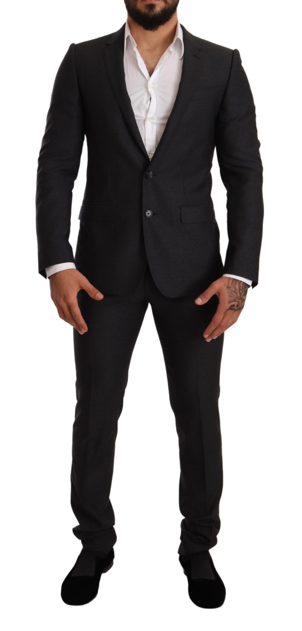 Gray wool Martini slim fit suit by Dolce & Gabbana, featuring tailored jacket and matching trousers on a mannequin.