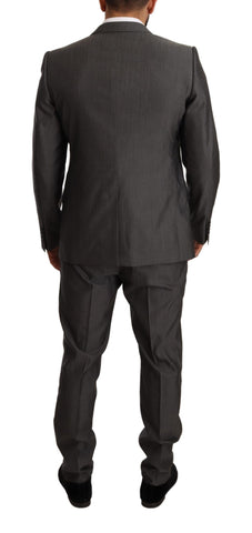 Gray metallic Martini slim fit suit set by Dolce & Gabbana, featuring tailored jacket and matching trousers.