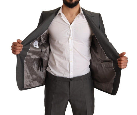 Gray metallic Martini slim fit suit by Dolce & Gabbana, tailored with a modern metallic finish and sharp tailoring details.