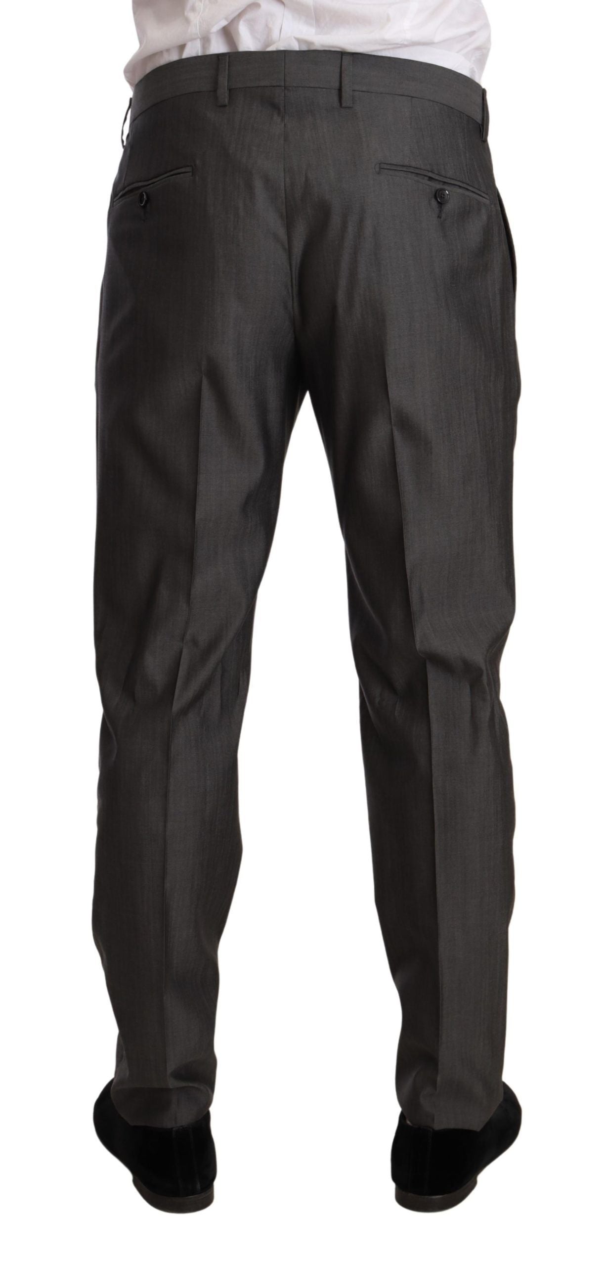 Gray metallic Martini slim fit suit set by Dolce & Gabbana, featuring tailored blazer and matching trousers on a plain background.