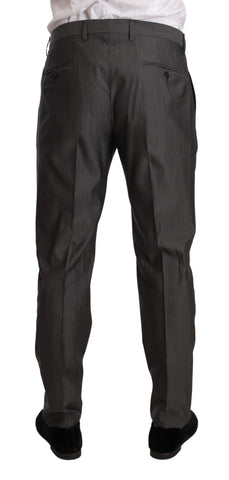 Gray metallic Martini slim fit suit set by Dolce & Gabbana, featuring tailored blazer and matching trousers on a plain background.