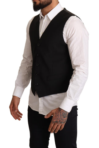 Black formal dress vest by Dolce & Gabbana, tailored fit with sleek fabric, suitable for elegant occasions.