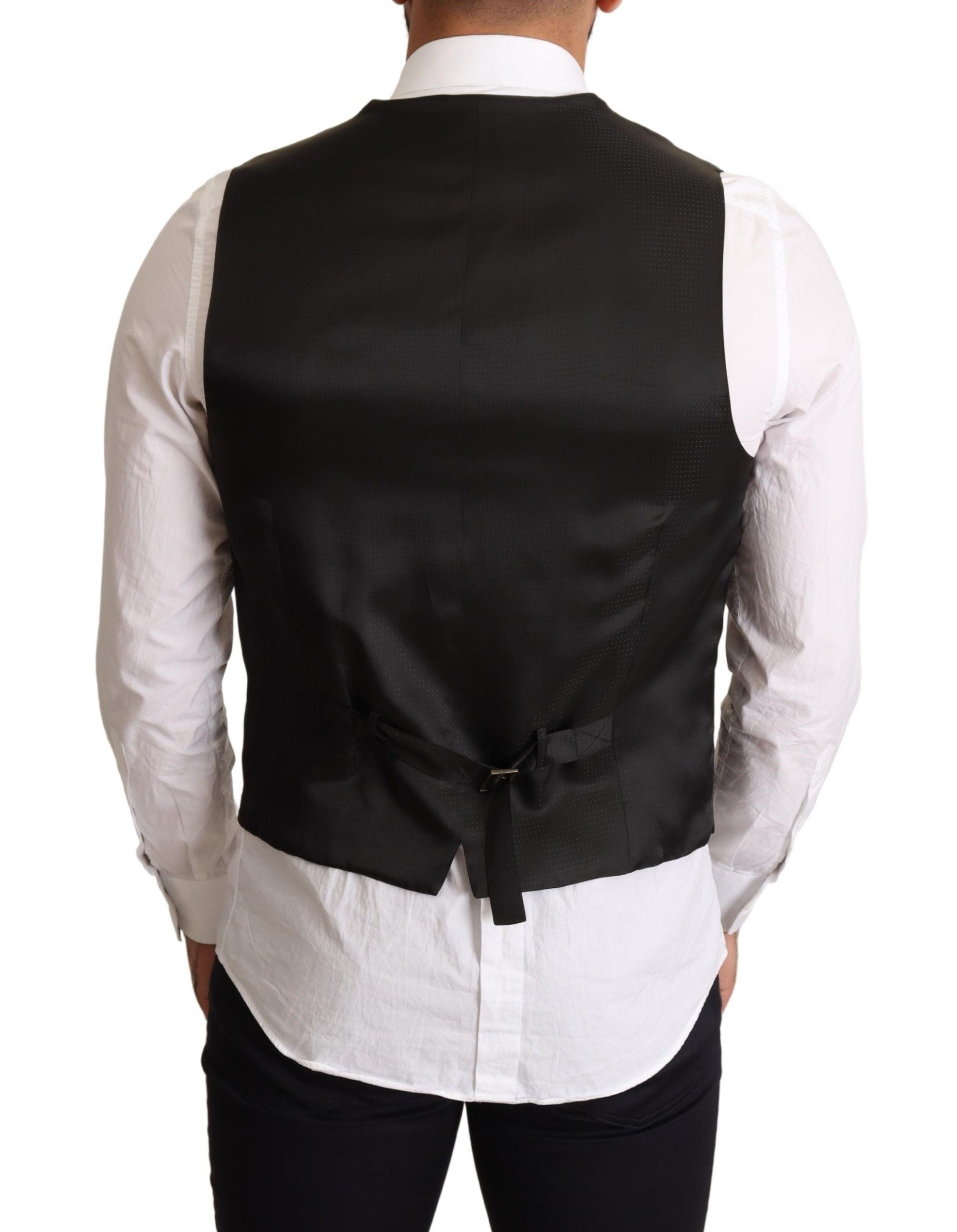 Black formal dress vest by Dolce & Gabbana, tailored fit with sleek fabric, designed for elegant occasions.