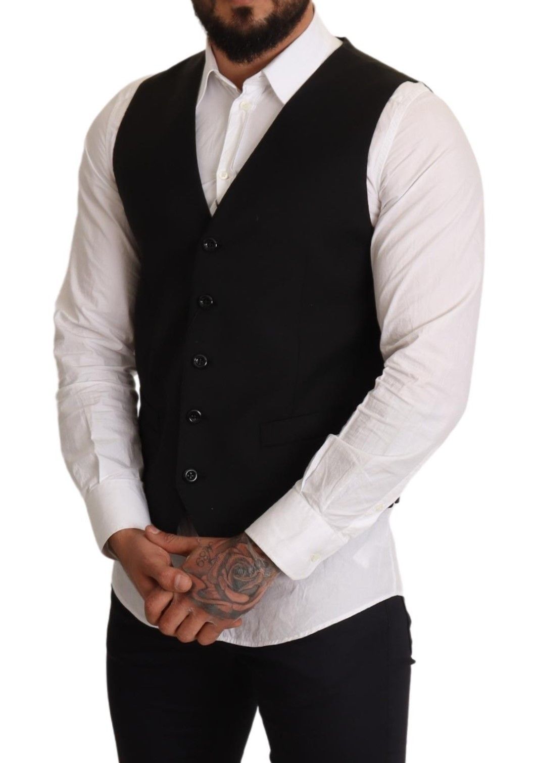 Black formal dress vest by Dolce & Gabbana, tailored fit with sleek fabric and classic design, shown on a hanger.