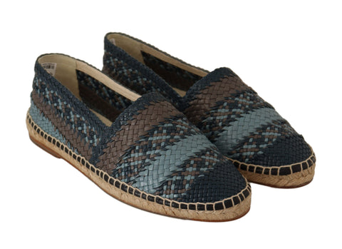 Blue and gray Dolce & Gabbana slip-on buffalo espadrille shoes with woven sole and casual design.