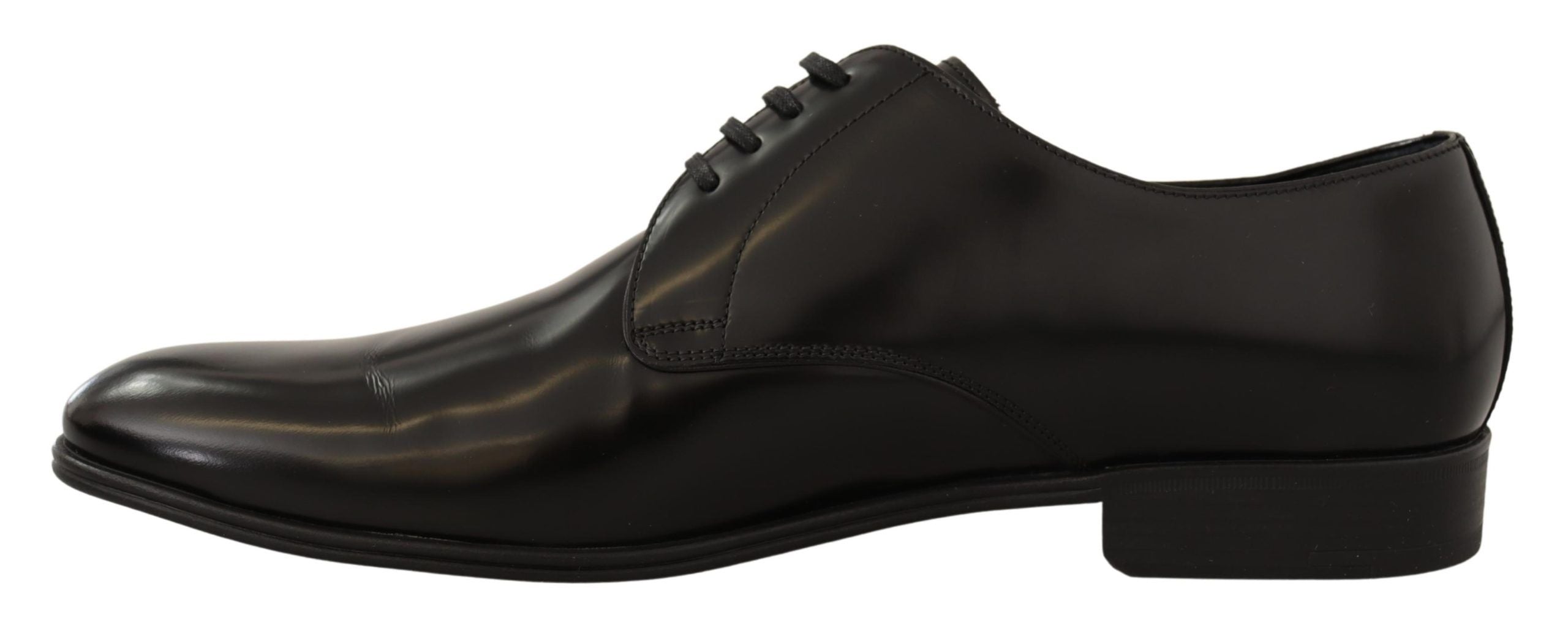 Black leather lace-up men's dress derby shoes by Dolce & Gabbana, featuring classic design and polished finish.