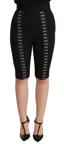 Black wool stretch slim fit high waist shorts by Dolce & Gabbana, shown on a model with a tailored fit and clean design.