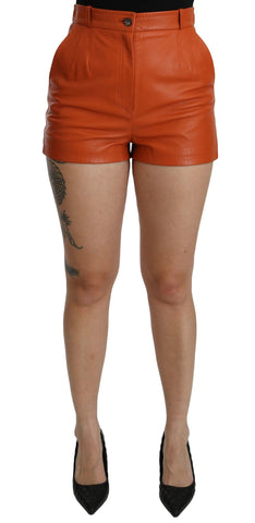 Orange leather high waist hot pants shorts by Dolce & Gabbana, featuring a fitted design and stylish high-rise cut.