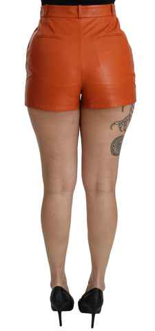 Orange leather high waist hot pants shorts by Dolce & Gabbana, featuring a sleek, fitted design and stylish waistband.