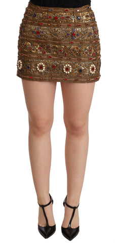 Gold crystal jacquard high waist skirt by Dolce & Gabbana, featuring intricate floral patterns and a luxurious high-rise design.